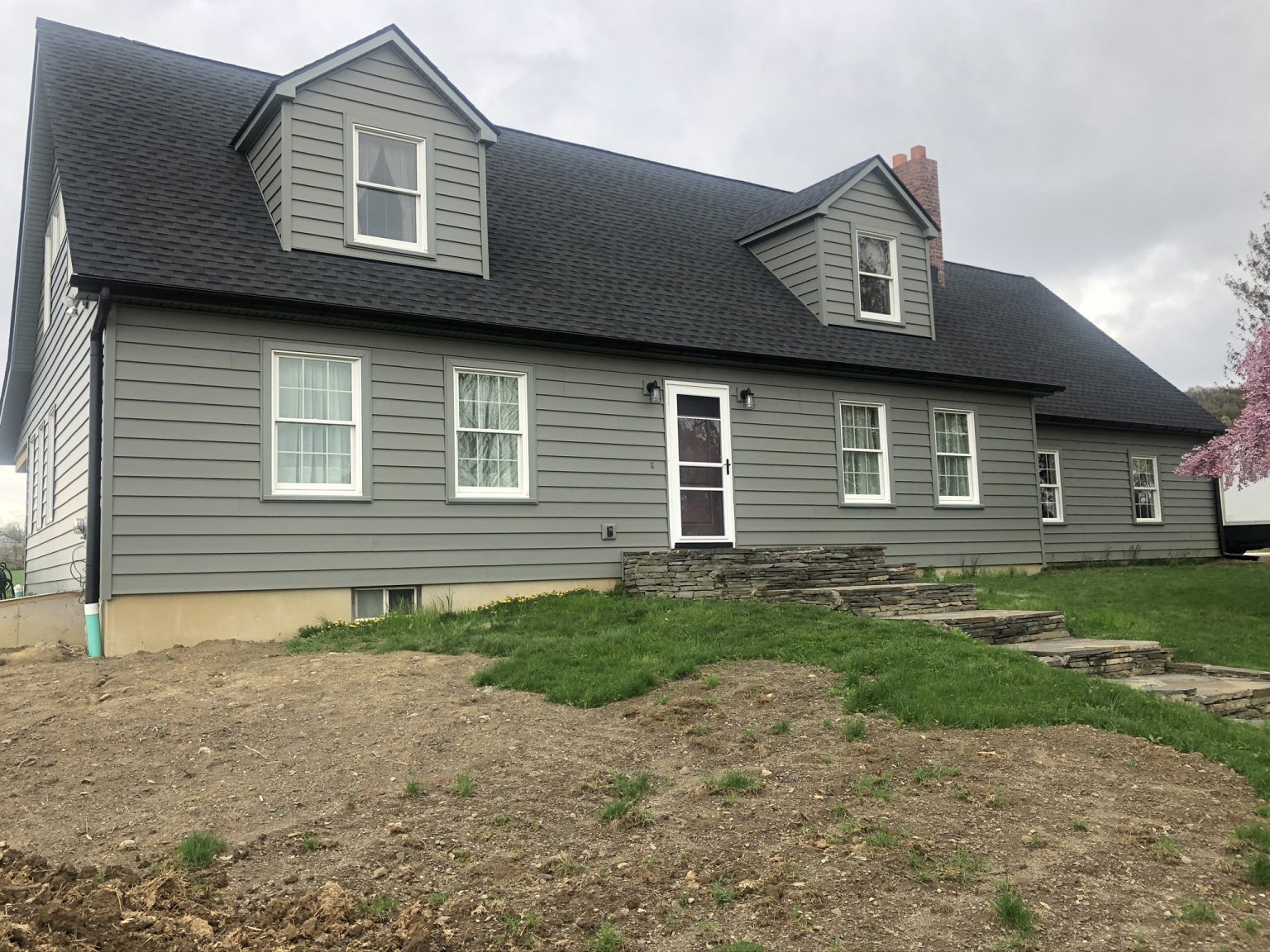 Seamless Gutter Installation on a modern home in Orange County New York.